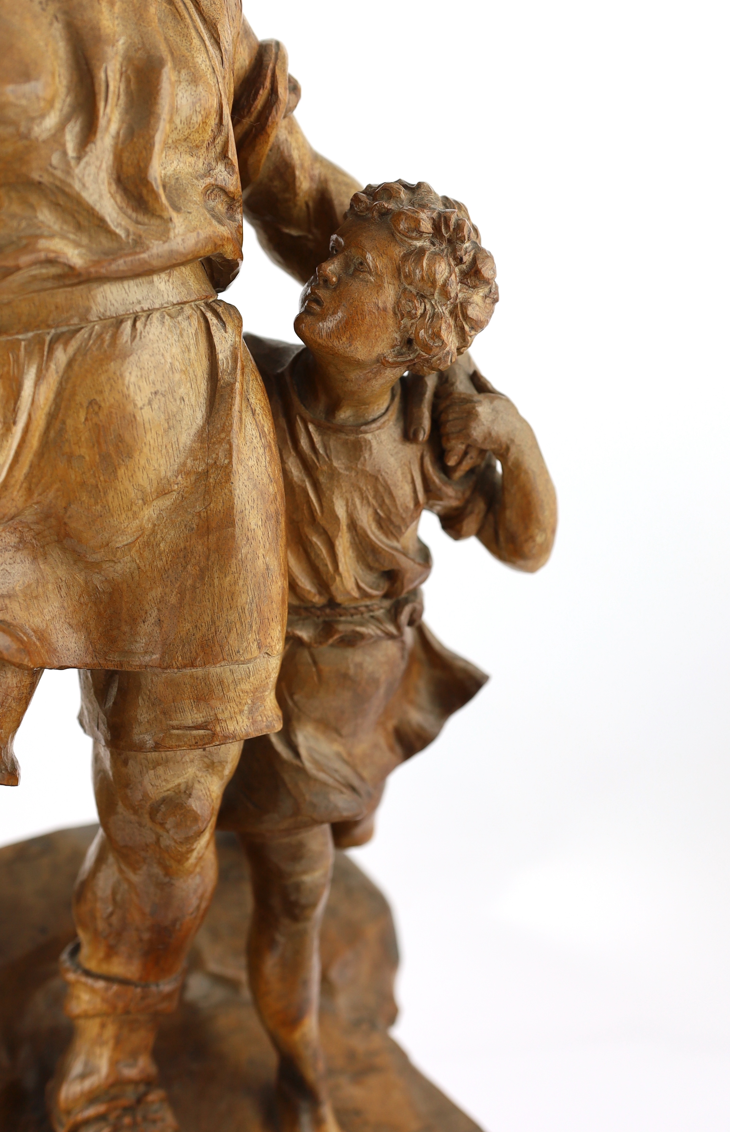 Jacob Abplanalp of Grindelwald, a carved group of William Tell and his son, 30cm high, 26cm deep, 71cm high